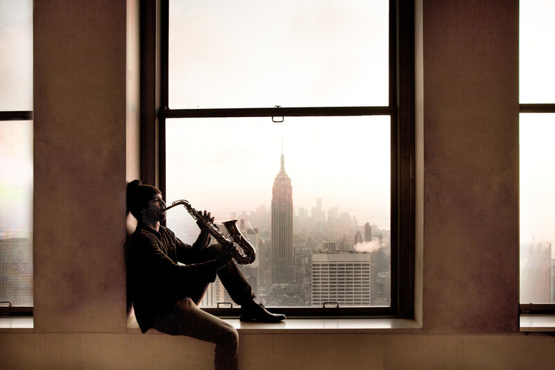 Man Playing Saxophone — Brown