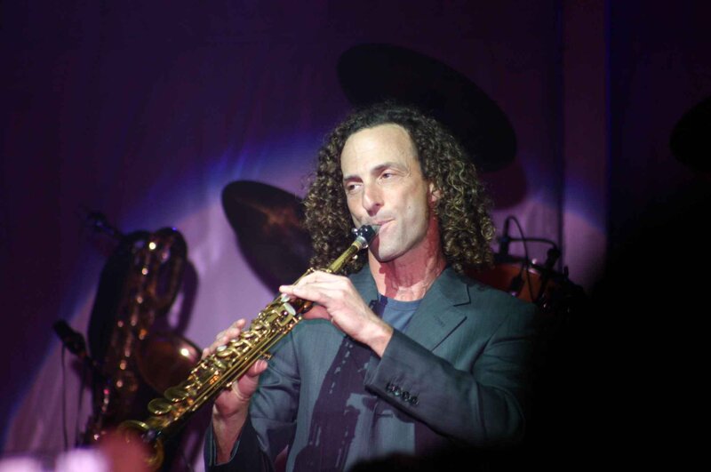 Man Playing Saxophone — Purple, Focused