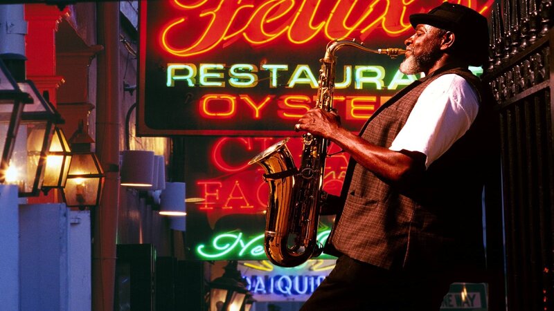 Man Playing Saxophone — Red