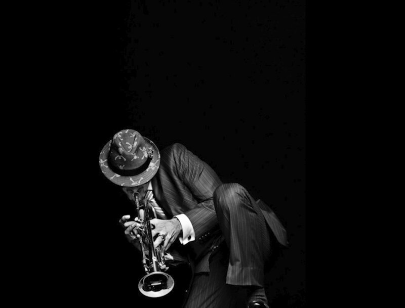 Man Playing Trumpet — Black, Dramatic, Photograph, Hat