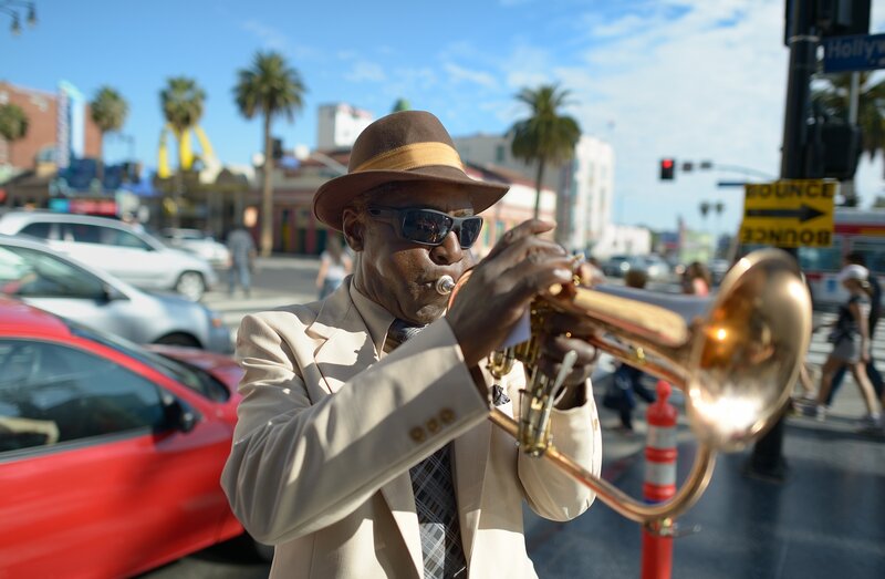 Man Playing Trumpet — Brown