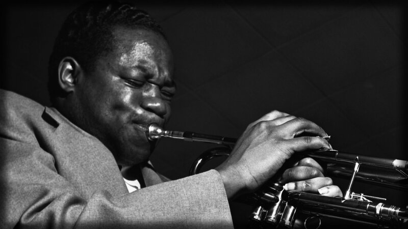 man playing trumpet