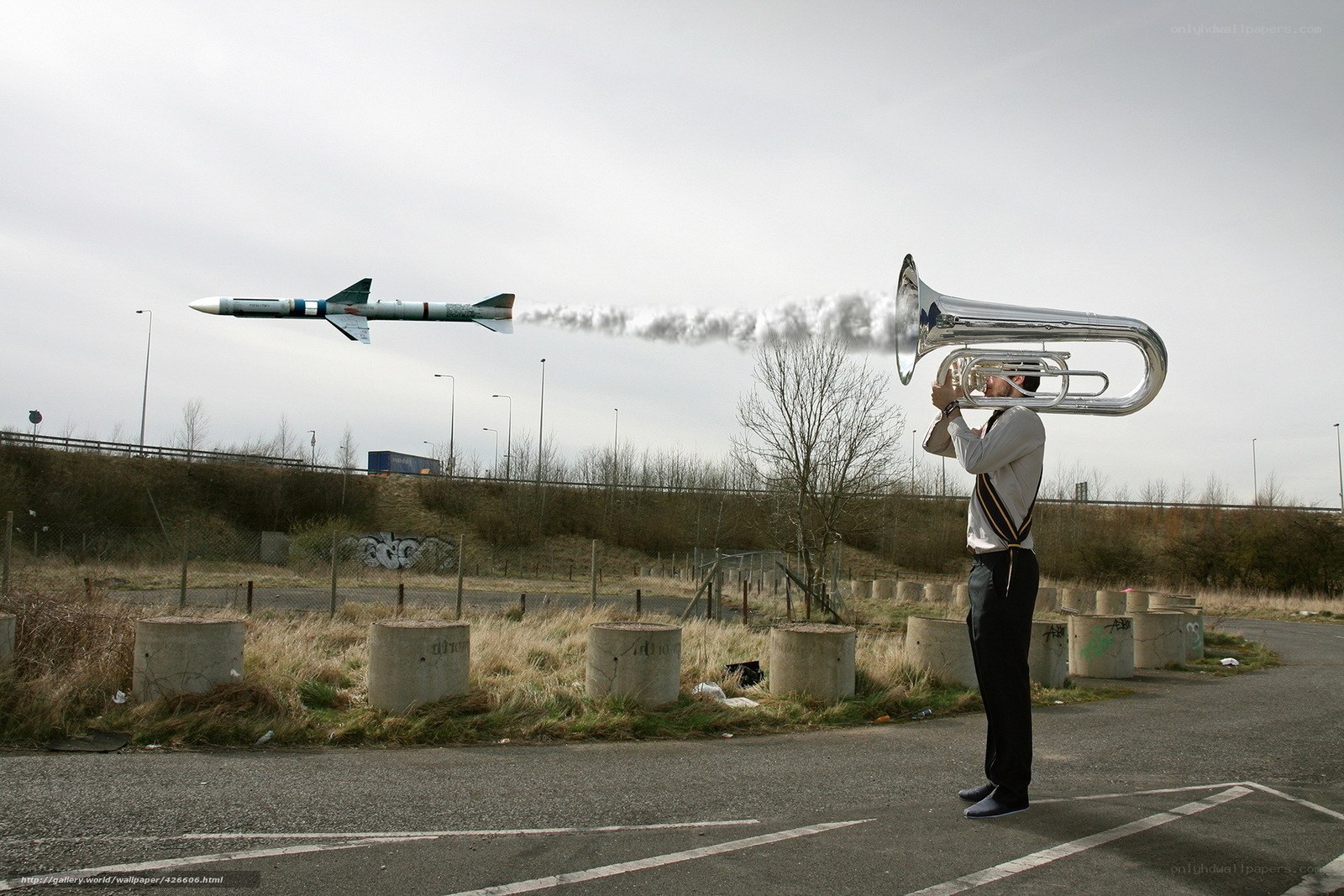 Man playing tuba with missile