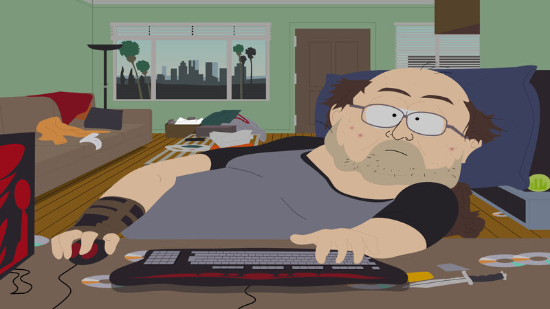 man playing video games at desk