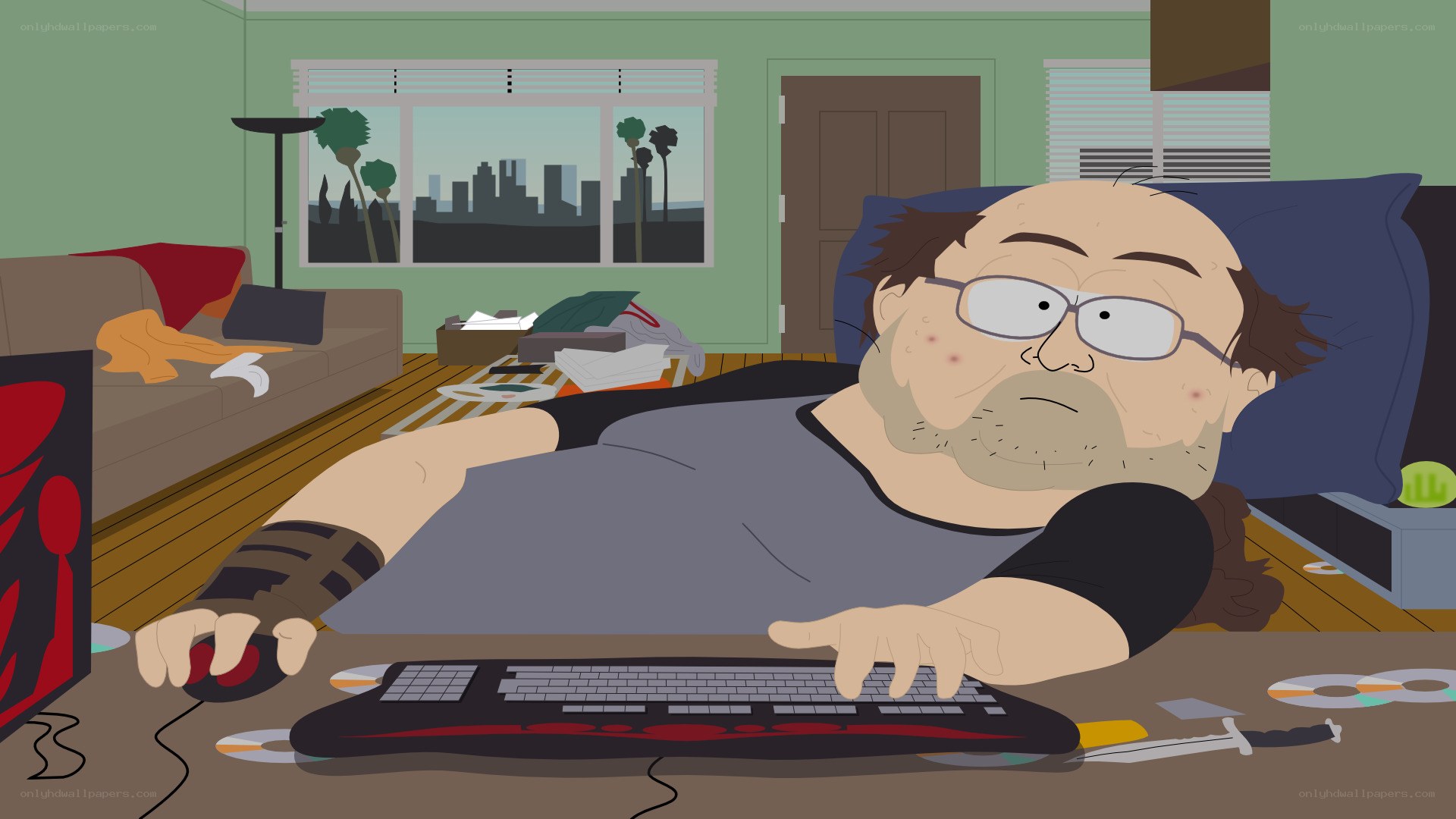 man playing video games at desk
