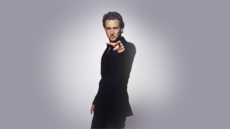 man pointing at camera