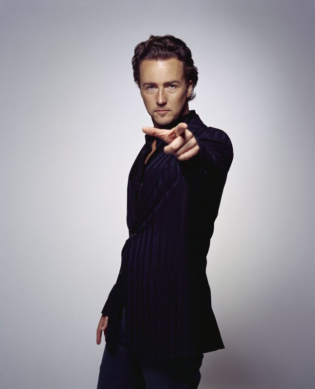 man pointing at camera
