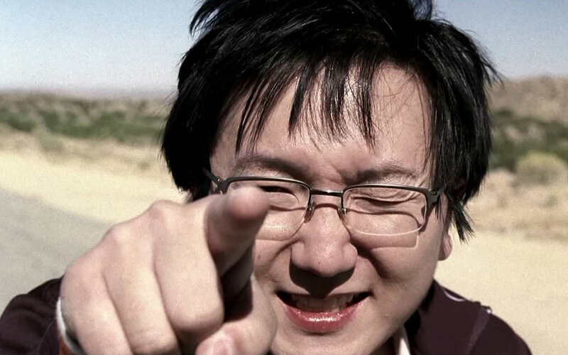 man pointing at camera