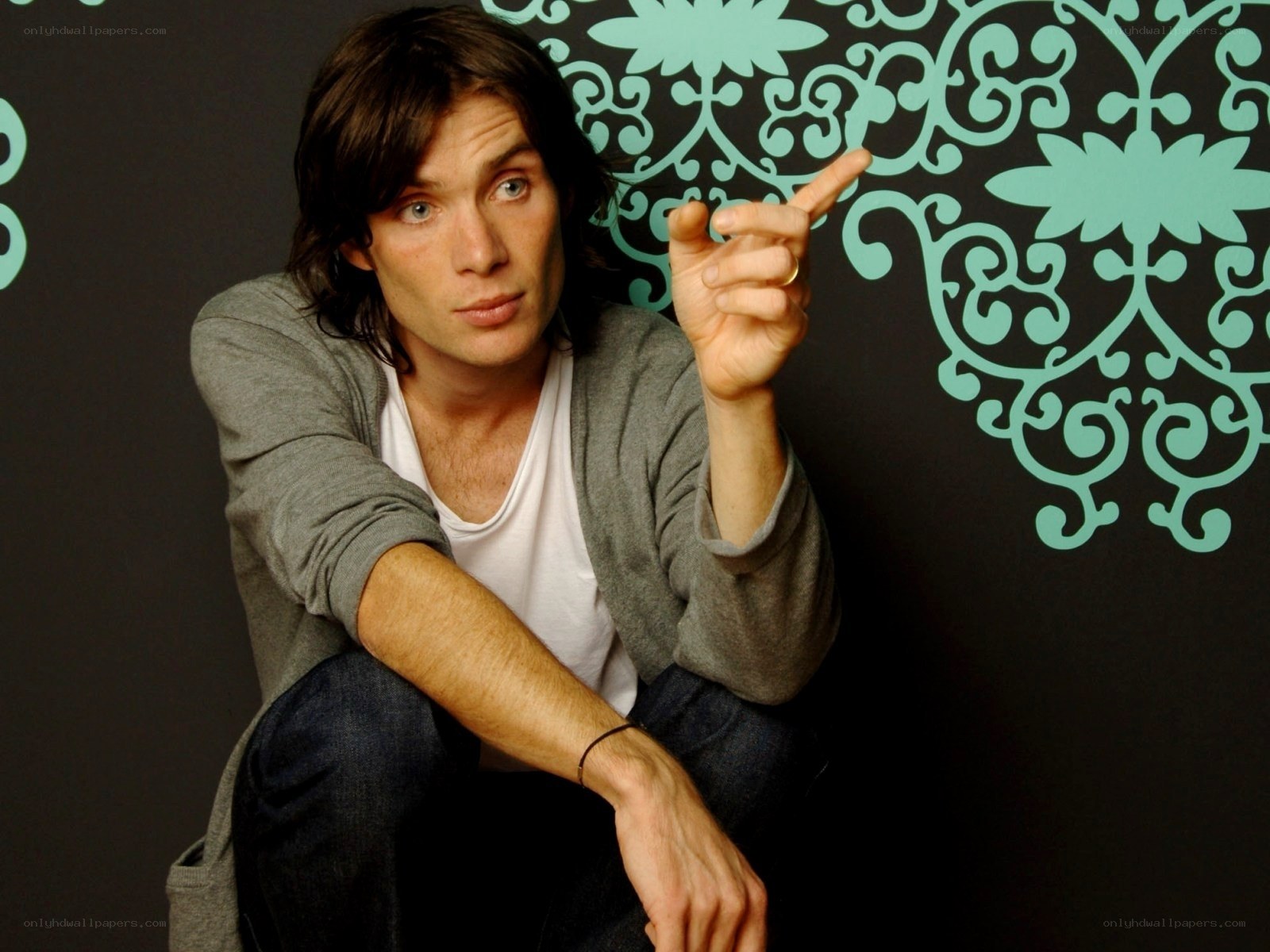 man pointing at camera