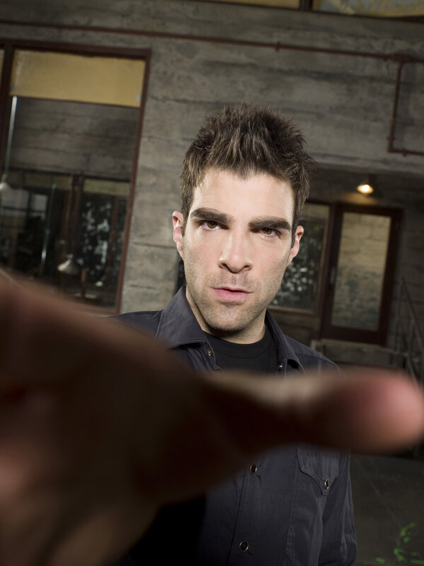 man pointing at camera