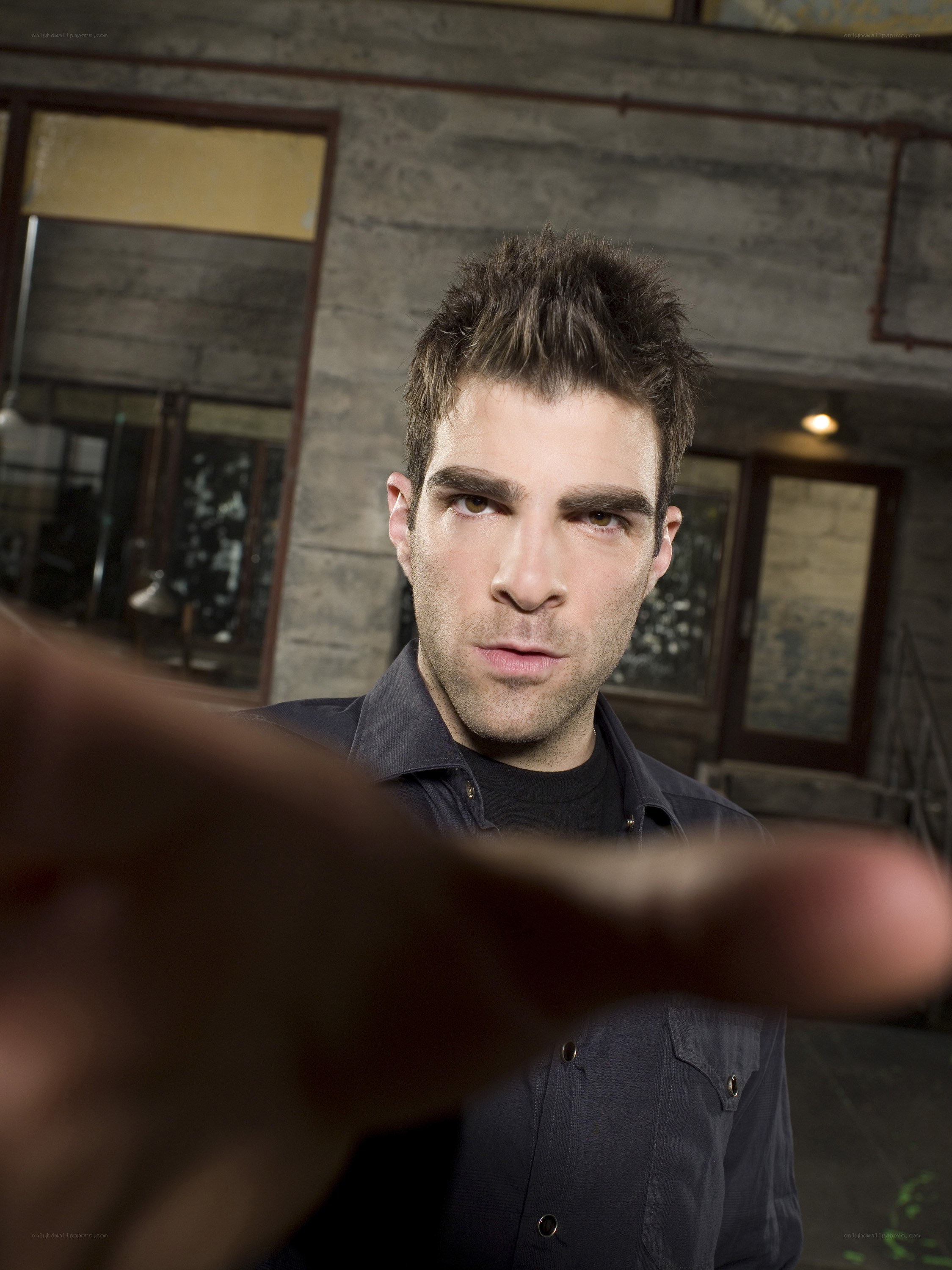 man pointing at camera