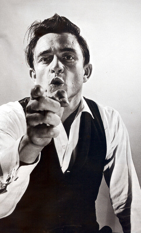 man pointing at camera