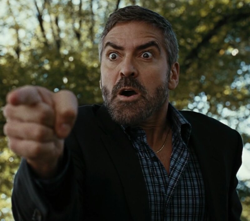 man pointing at camera