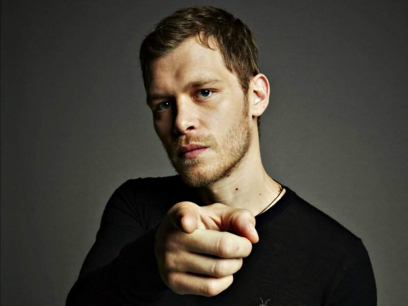 Man Pointing at Camera — Black, Intense, Photograph
