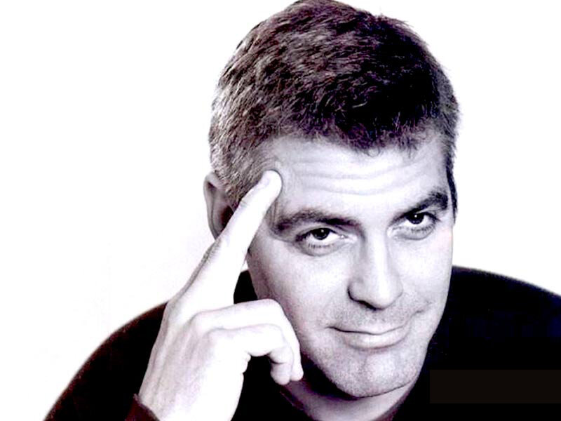 man pointing to his head