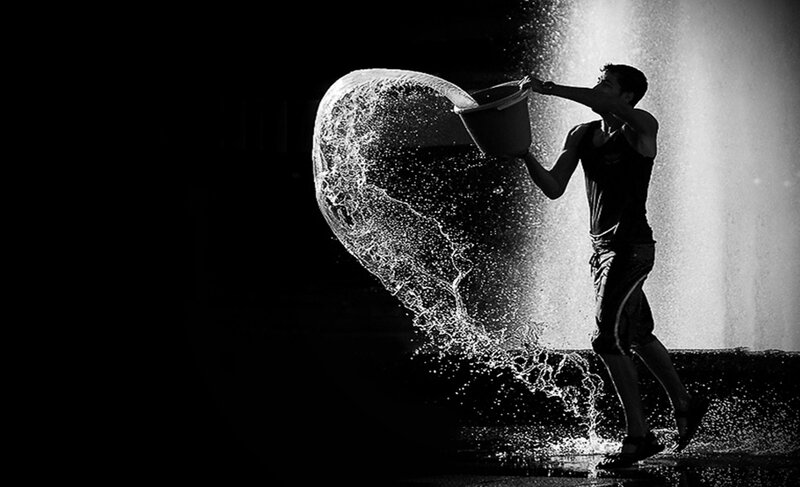 Man Pouring Water