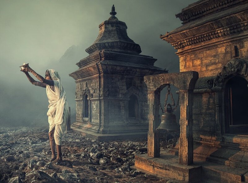 Man praying at ancient temple