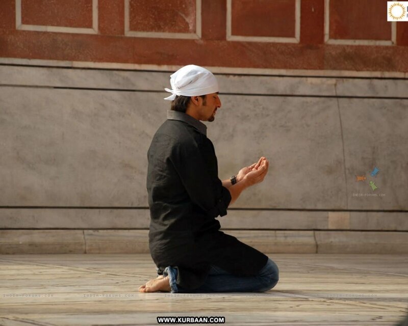 man praying on floor
