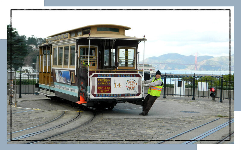 Man Pushing Trolley Car