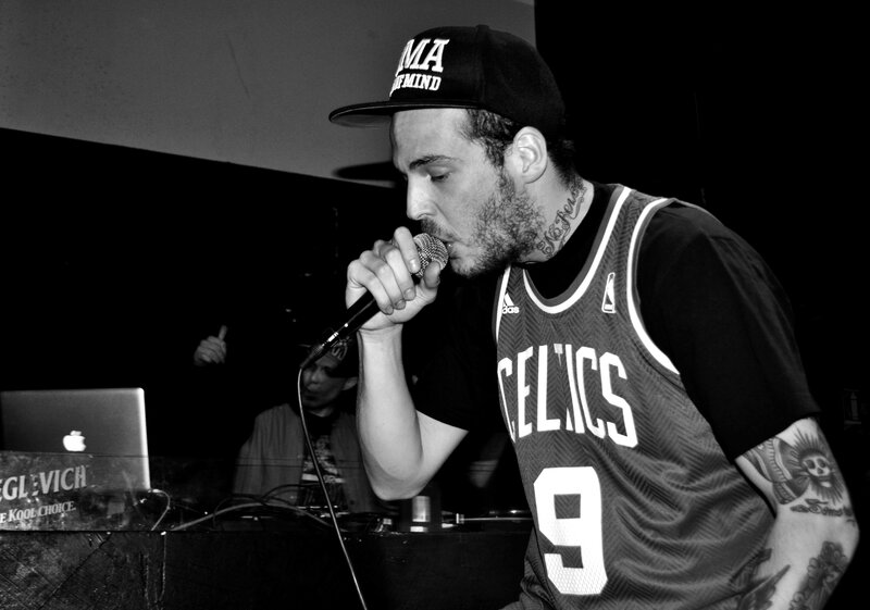 Man Rapping into Microphone — Black
