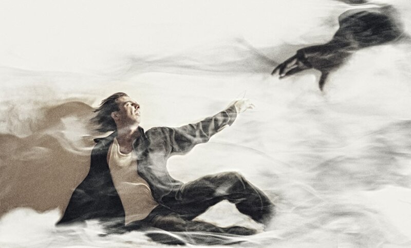Man Reaching Out in Storm