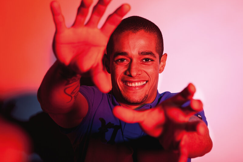 man reaching out with hands