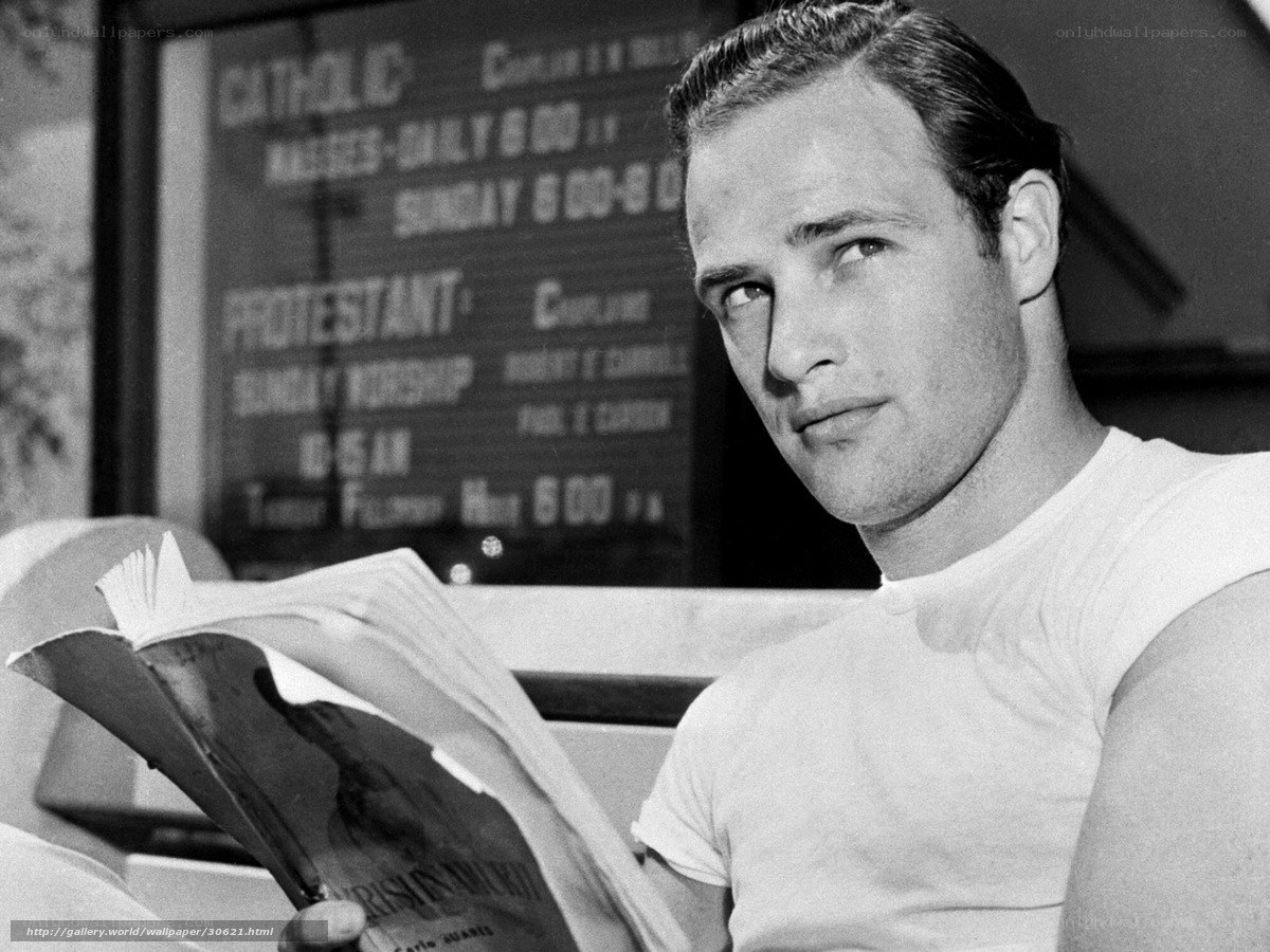 man reading book in church