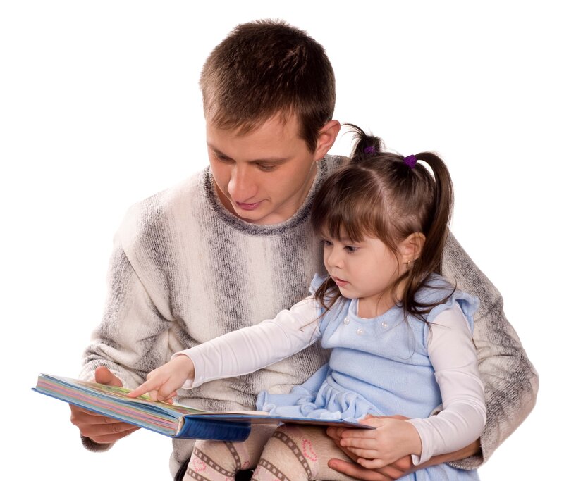 man reading book with child