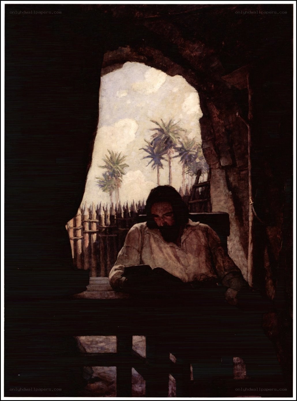 Man reading in a cave