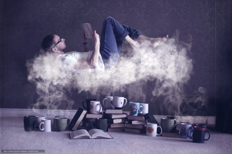 man reading in a cloud of steam
