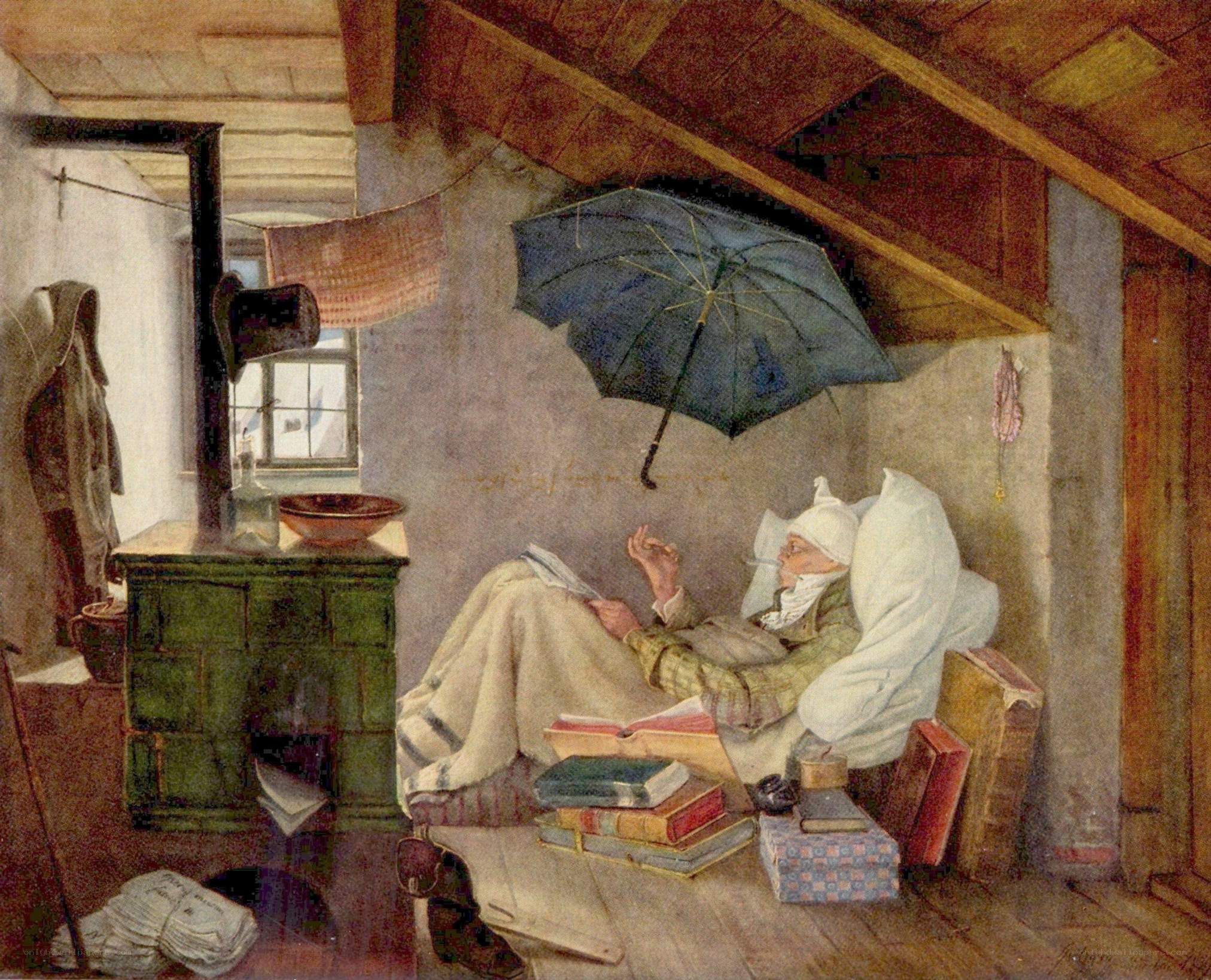 Man reading in attic room