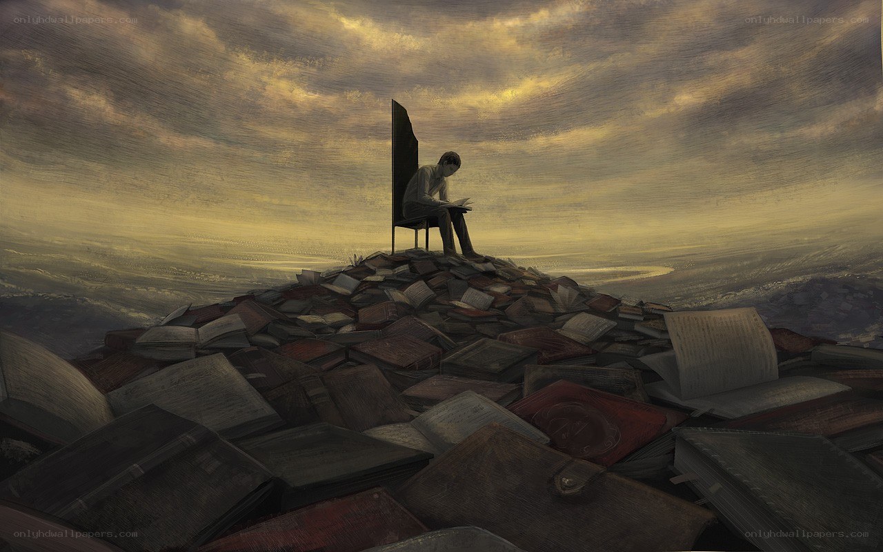 man reading on a book hill