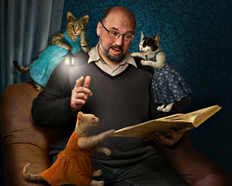 Man Reading to Cats