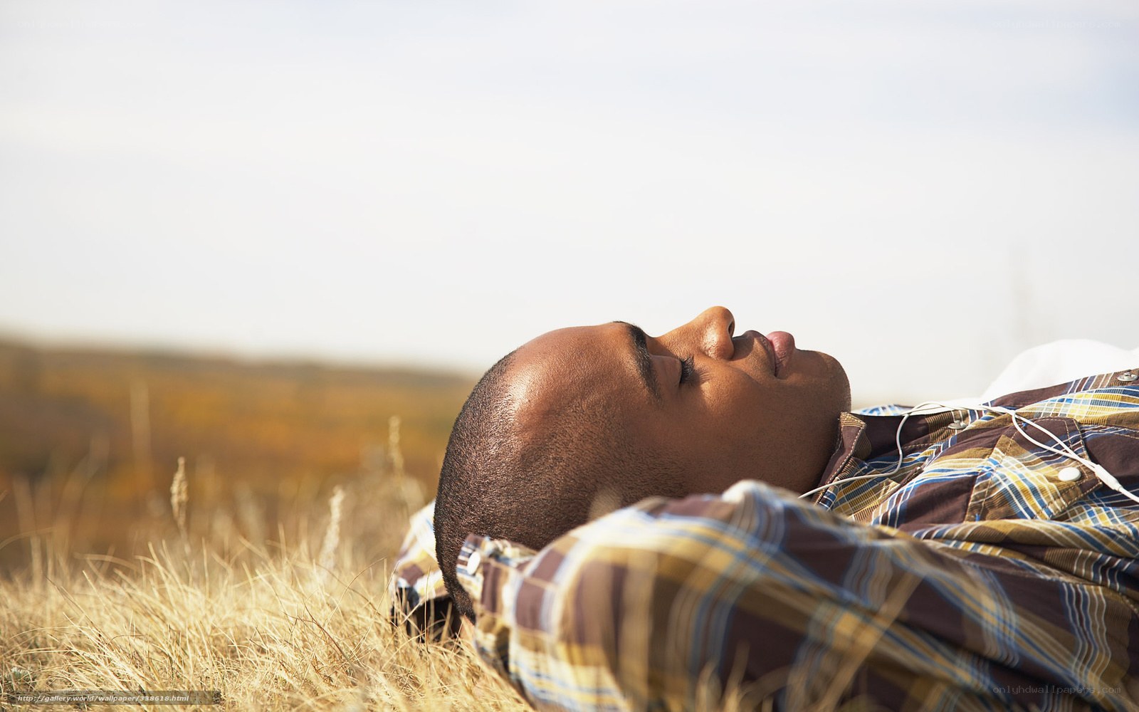 man relaxing in field