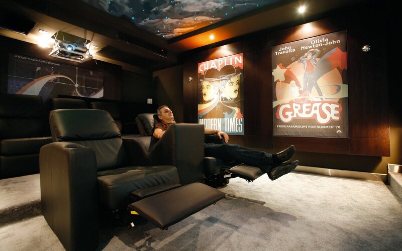 Man relaxing in home theater
