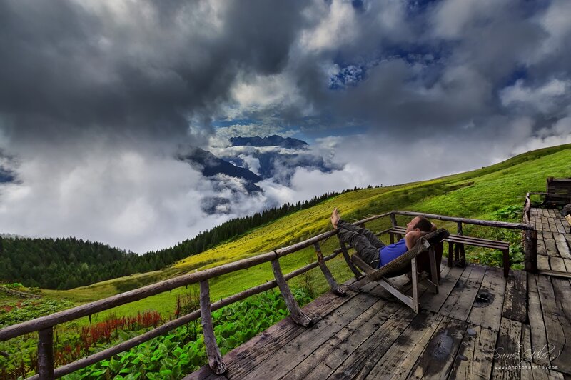Man Relaxing on Deck