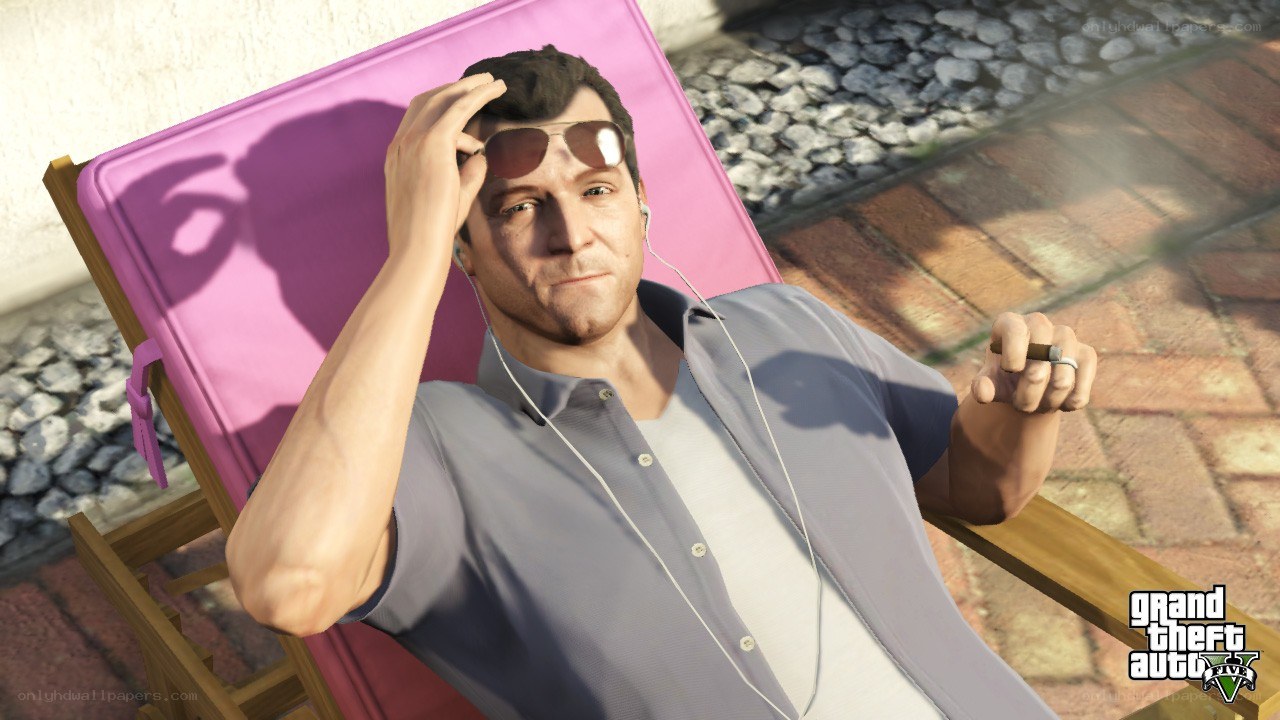 man relaxing on lounge chair