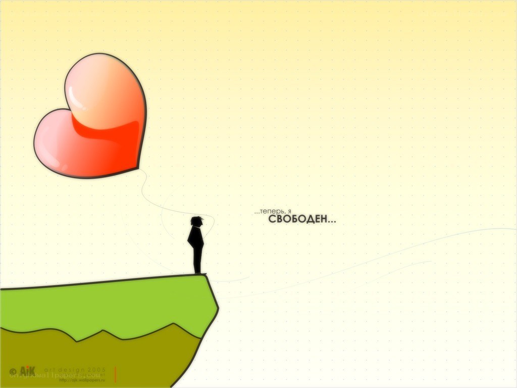 man releasing heart balloon