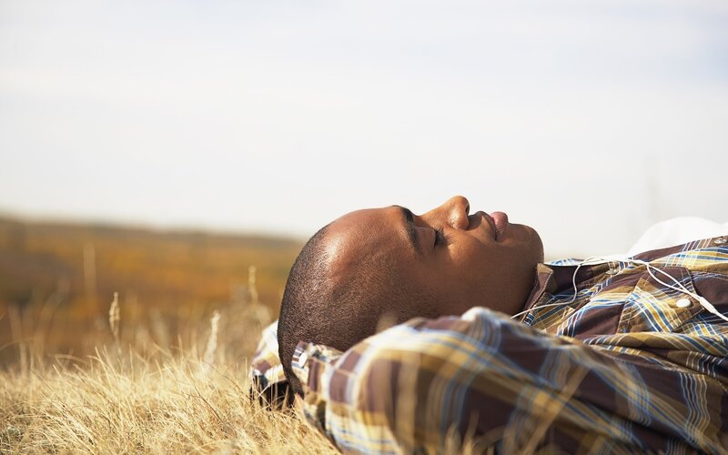 man resting in a field