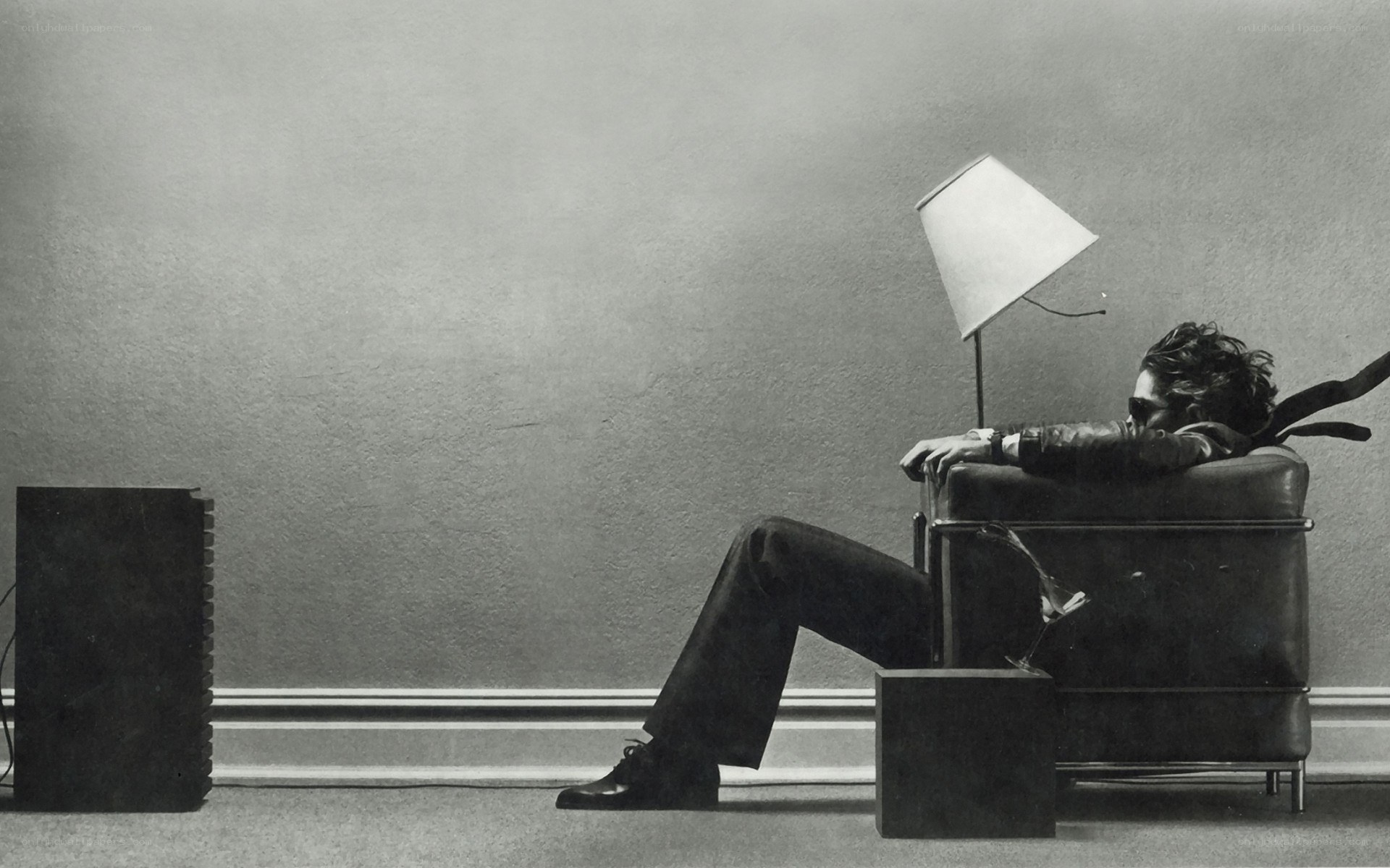man resting in armchair