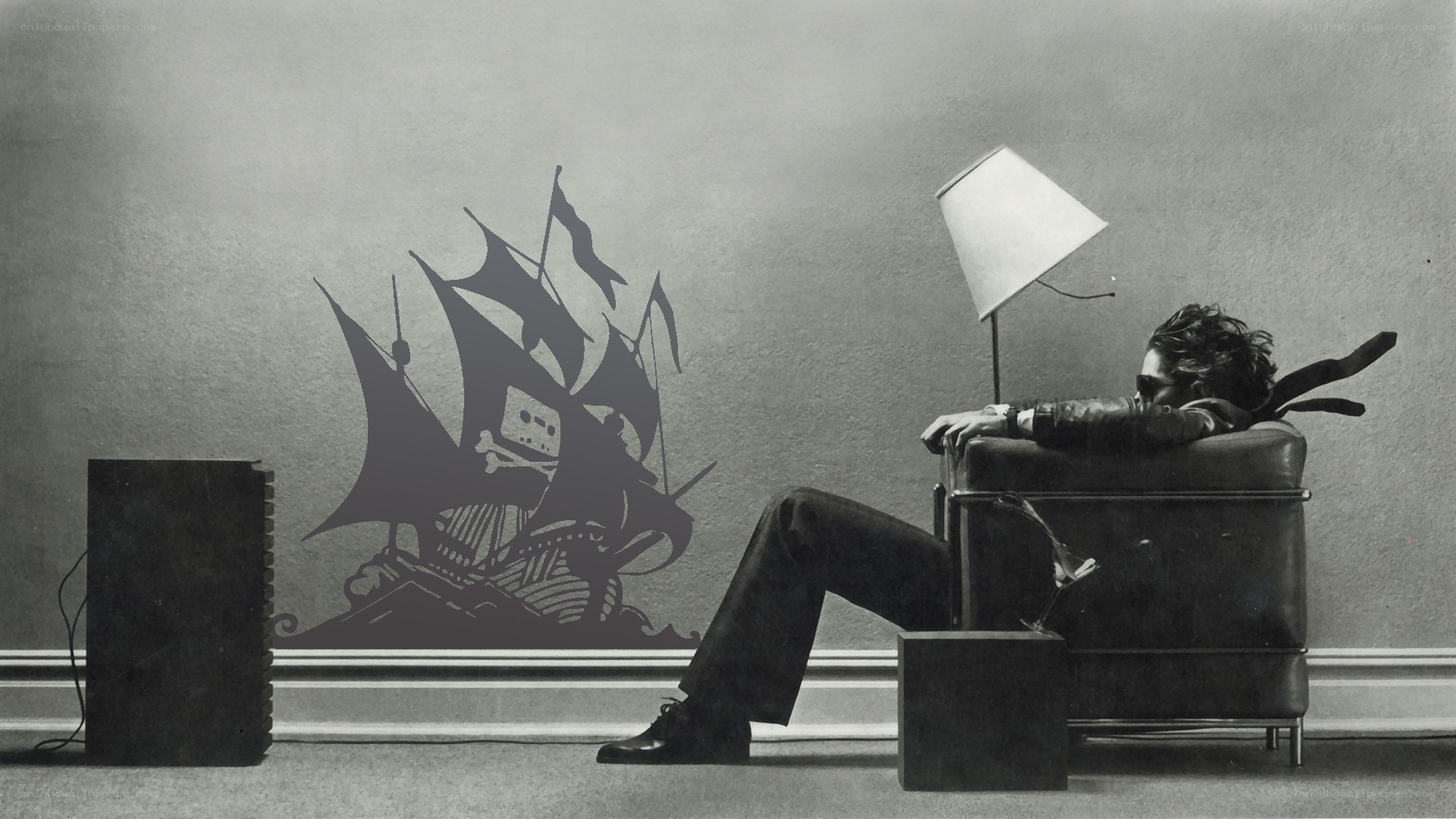 Man resting in armchair with ship shadow