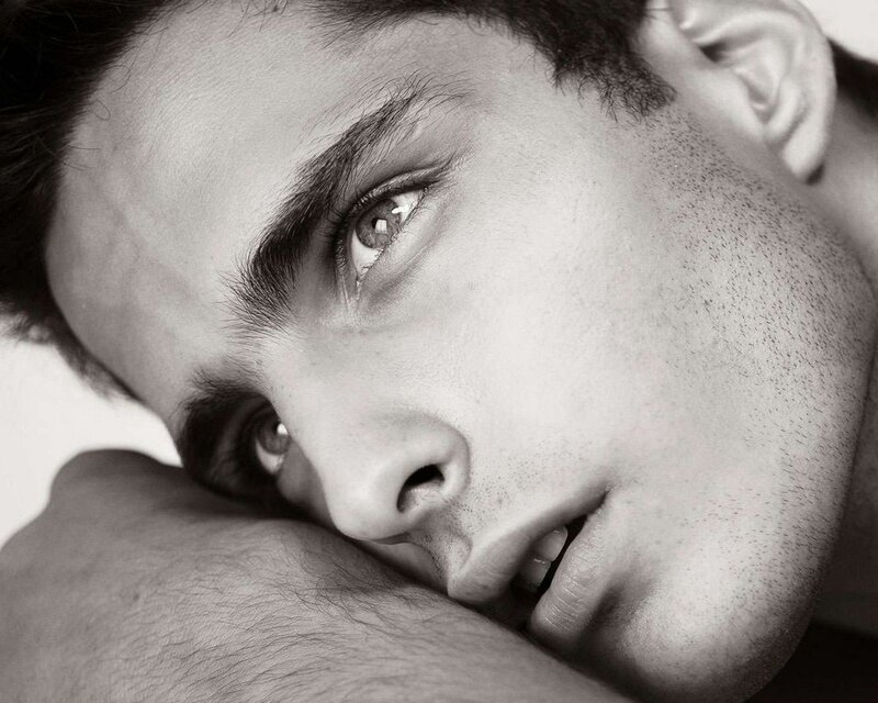 man resting on arm