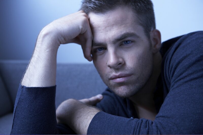 man resting on couch