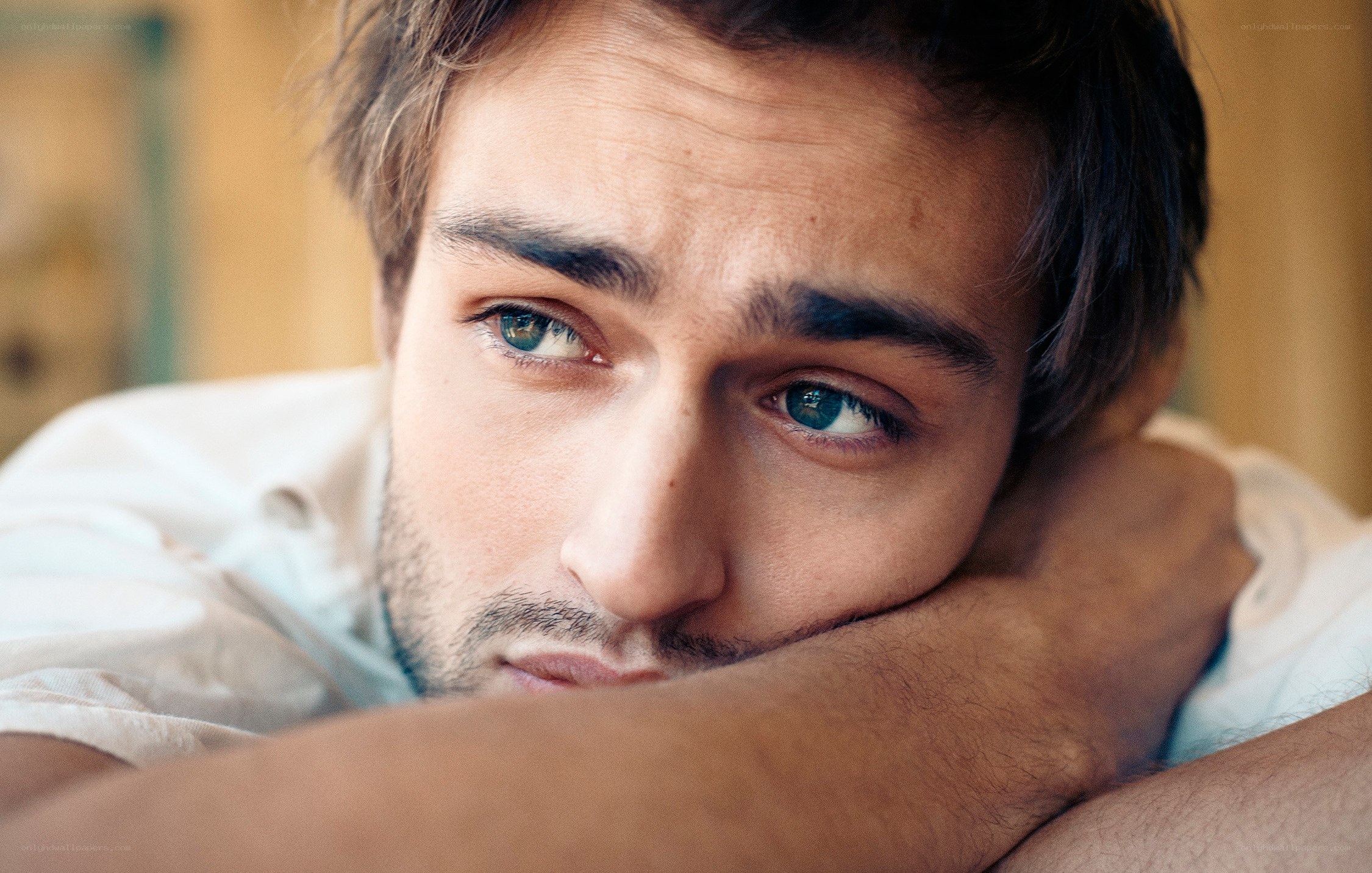 man resting with arms crossed