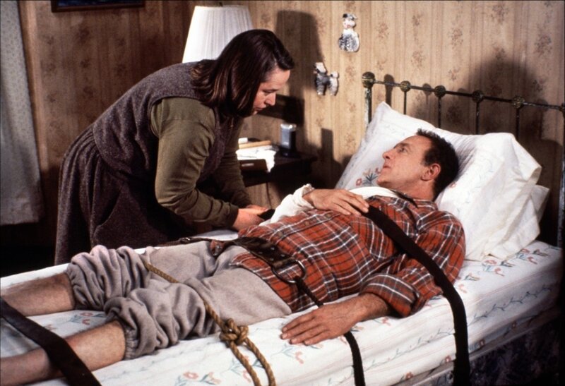 Man Restrained in Bed