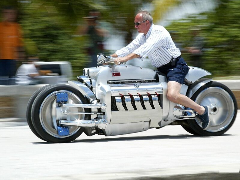 Man riding a custom motorcycle