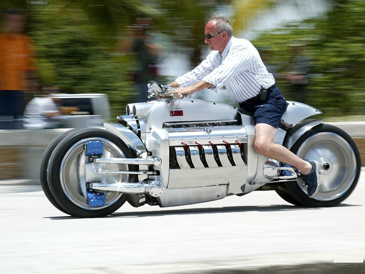 Man riding a custom motorcycle