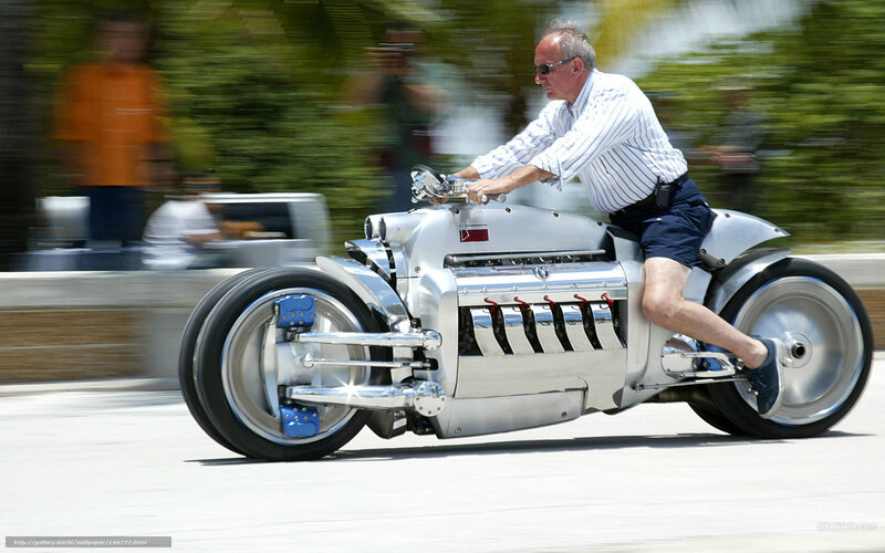 Man riding a custom motorcycle