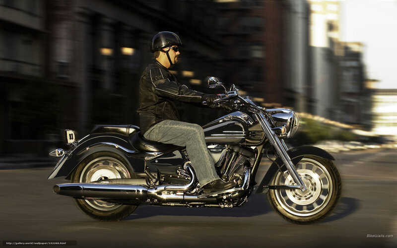 Man riding a motorcycle in the city