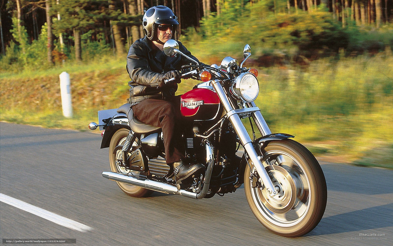 man riding a motorcycle